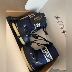 Brand new with tags baby moon boots fits US 7c up to 9.5c